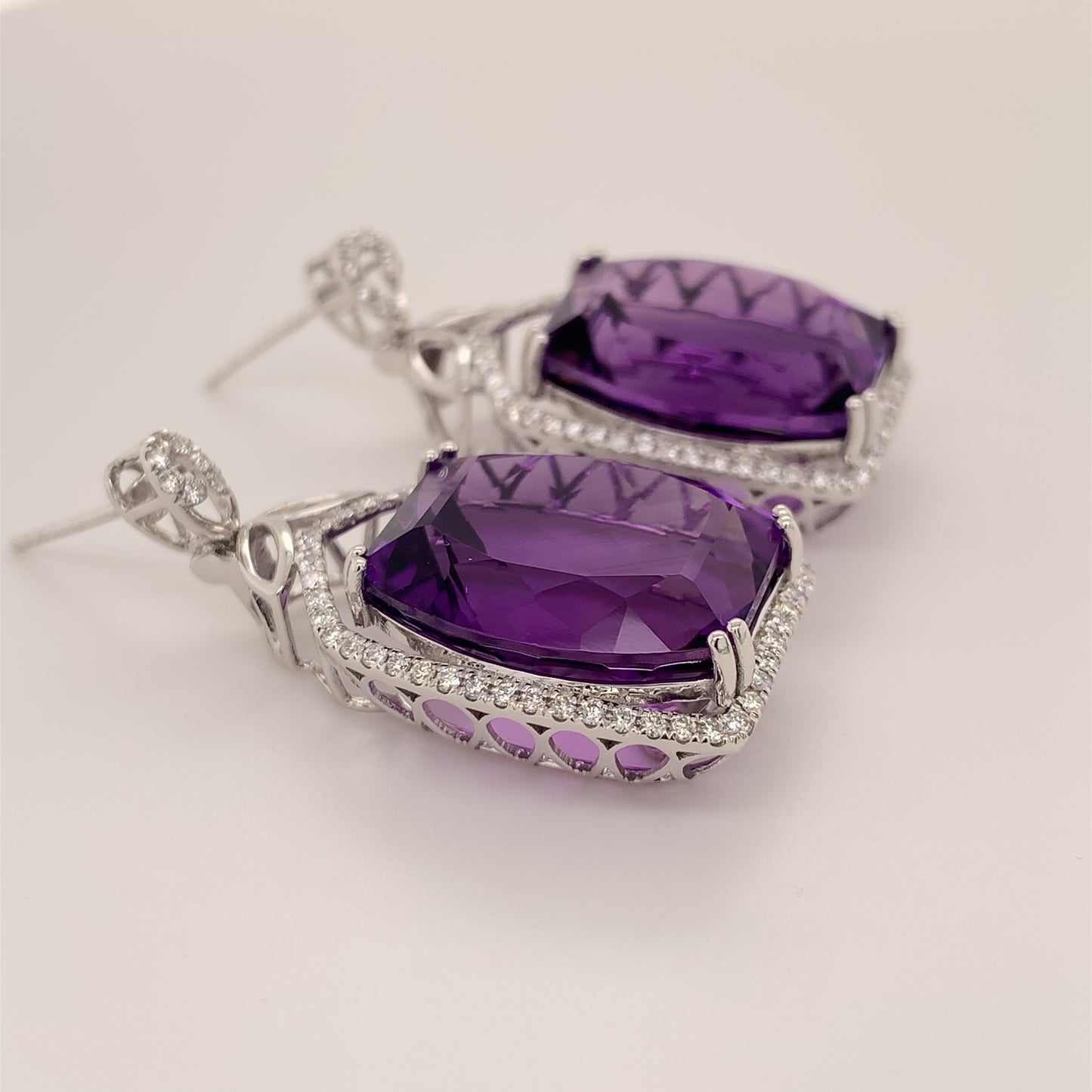 33.81 Carats Amethyst Earrings