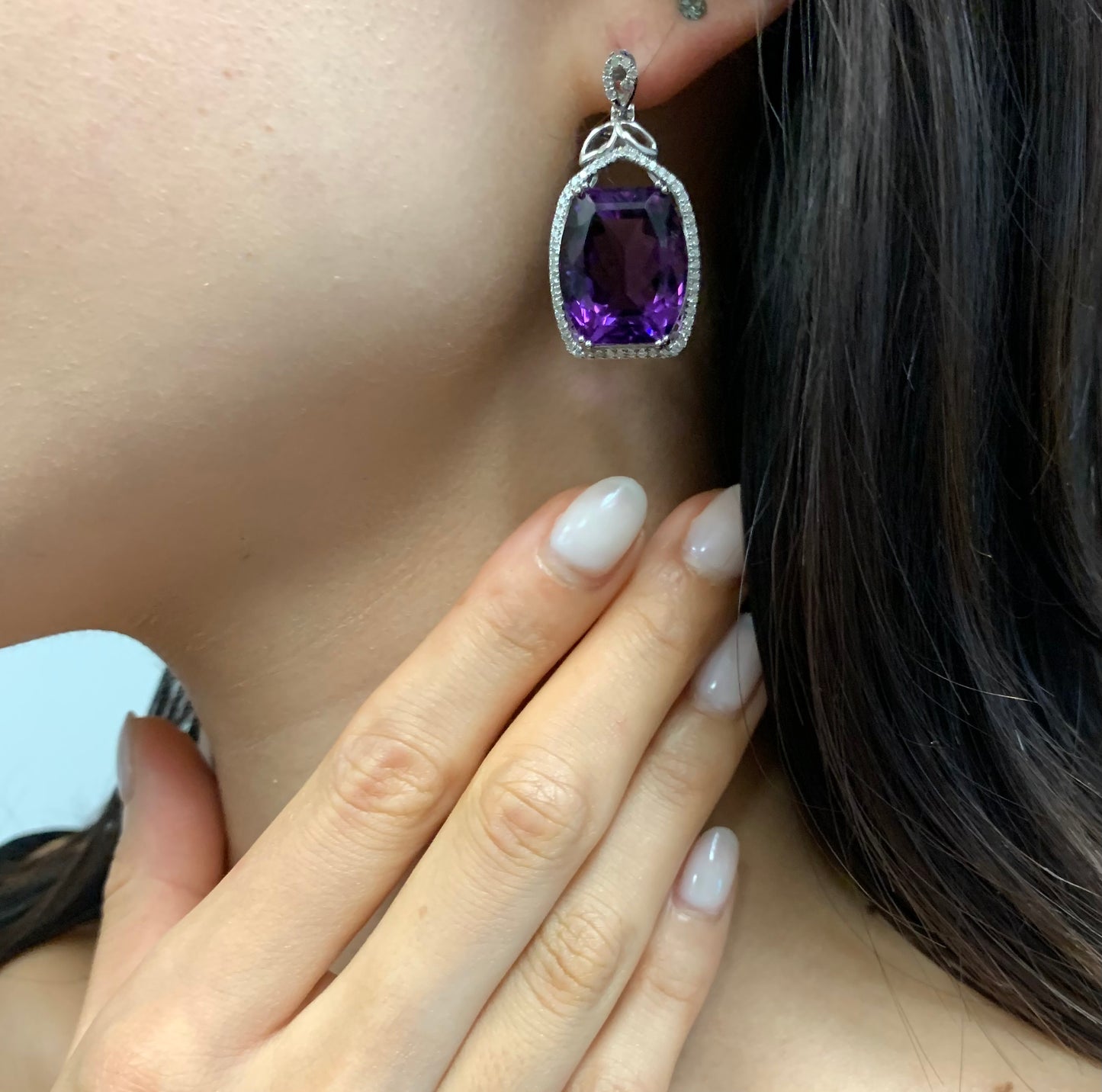 33.81 Carats Amethyst Earrings